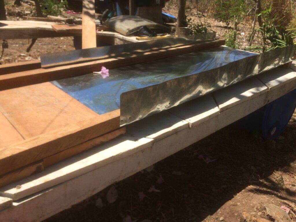 The sheet metal is folded up and ready to attach the domes.